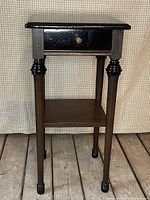 Full view of wooden side table front and lower shelf