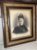 Full view of framed charcoal portrait