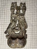 Front view showing detailed hunting motif and match pocket