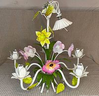 full view of floral chandelier with arms, flowers and wiring