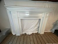 Front view of white MDF fireplace mantel surround