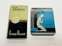 Front view of both Vantine’s incense tins showing graphics and text