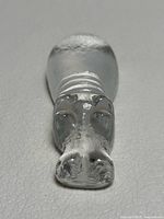 Front view of clear glass hippopotamus figurine