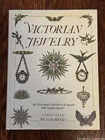 Front cover showing full title and jewelry illustrations