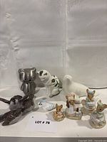 Group shot of all figurines standing on white background