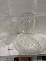 Full lot view: leaf bowl, leaf plate, two footed cups