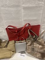 Group image of all four bags: red tote, cream Coach tote, bronze Tignanello hobo, silver Farnell evening purse