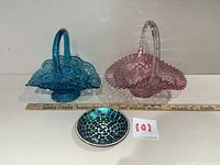 Full view of both baskets and mosaic bowl with ruler for scale