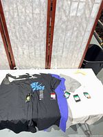 All six shirts laid out on table