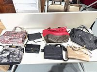 All eight bags arranged on table