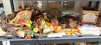 Shelf view showing majority of fall décor pieces