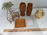 Group shot of all five items with ruler for scale