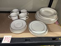 Full set showing plates, bowls, saucers and cups