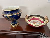 Both ceramic pieces on display: Carlton Ware pedestal vase and Austrian handled bowl
