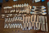 Full layout of all flatware pieces on table