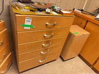 Front view of five-drawer cabinet and lidded bin