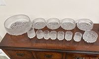 Full set of serving bowl, four fruit bowls, six cordial glasses, sugar bowl, creamer