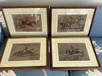 Group shot of four framed prints