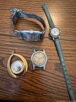 Group shot showing all four watches