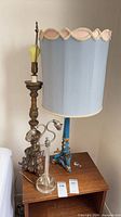 All three table lamps on side table