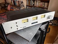 Front view of Magnum Dynalab MD 90 tuner on shelf