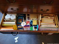 Drawer view showing full assortment of office supplies