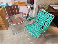 Both aluminum lawn chairs side by side showing overall style and materials