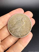 Reverse side of 1922 Peace Dollar showing eagle and ONE DOLLAR PEACE legends