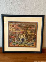 Full view of framed embroidered rank badge