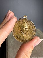 Front view showing St. Ignatius Loyola portrait and inscription