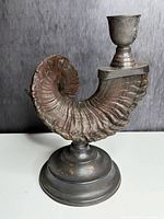 Side view of horn candlestick showing overall form