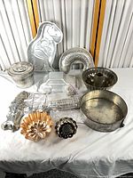 Overall lot layout showing all baking pans and molds