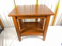 Front view Mission style wood end table, shows top and lower shelf