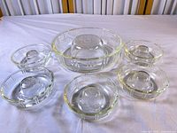 Entire set: one large and six small clear glass Jell-O molds