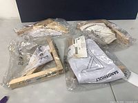 All four packaged wooden shelf brackets