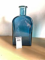 Front view of royal blue heavy glass vase