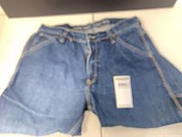 Front view of jeans with size sticker