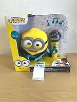 Front view of boxed Duet Buddy plush and microphone