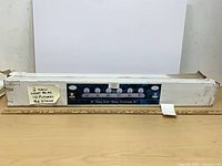 Full view of boxed vanity strip fixture with note indicating two new fixtures