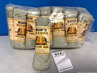 Bag holding multiple balls of Patons Beehive tapestry wool