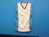 Front view of sleeveless basketball jersey on hanger