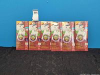 Front view of six sealed Avery iron-on transfer packs