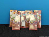 Front view of six Avery iron-on transfer packs