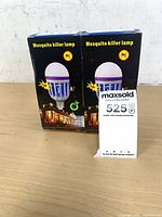 Two boxed mosquito killer lamps front view