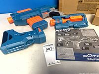 Blaster body, stock, barrel extension, magazine, manual