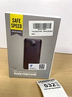 Front of sealed retail box showing Safe Speed branding, PD30W model and digital display image