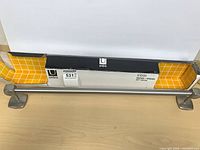 Towel bar with original box front view