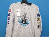 Full front view showing main graphic and sleeves