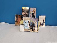 Group view of all six VHS tapes front