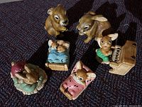 All seven rabbit figurines grouped